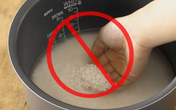 People wash rice directly