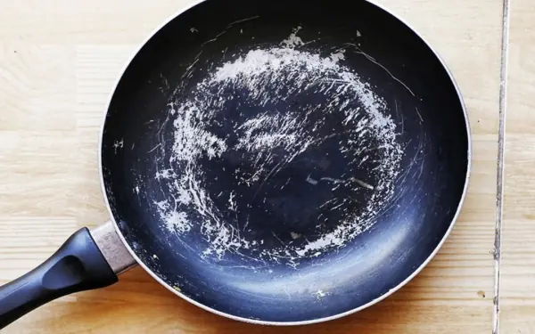 The pan has lost its non-stick coating.