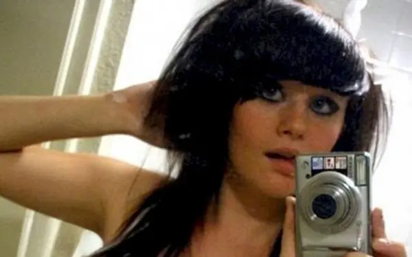 What's wrong with the beautiful woman's photo?