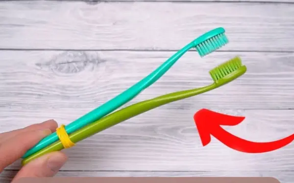 Tie Two Old Toothbrushes Together