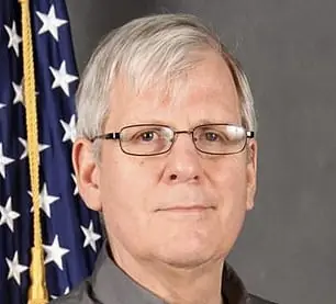 Charles Houston Jr., 77