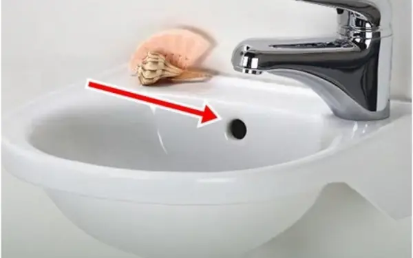 The small hole on the sink that seems unnecessary actually has a surprising function.