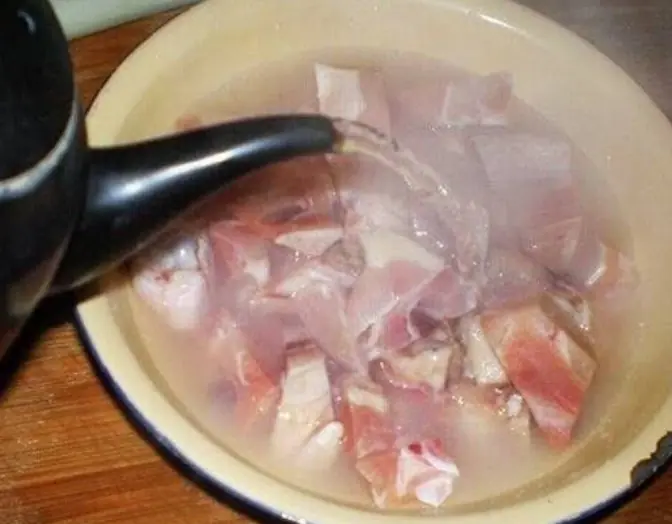 Should meat be blanched in boiling water before cooking?