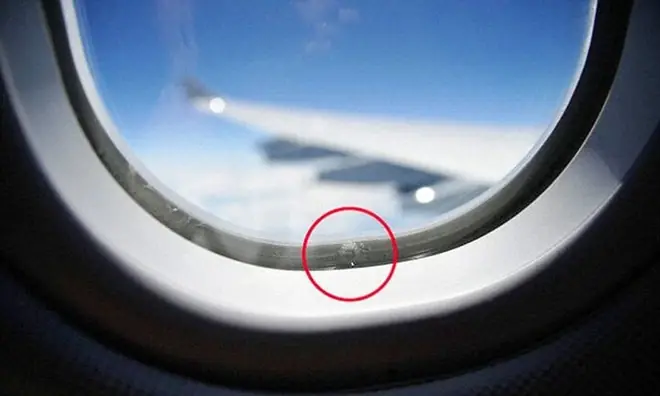 Why Do Airplane Windows Have a Tiny Hole? The Hidden Safety Feature You Never Noticed