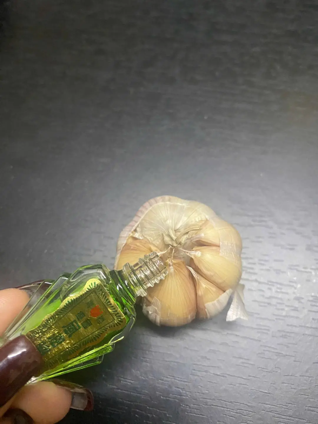 Garlic Dipped in Essential Oil: hang in the window, repels many things in the house