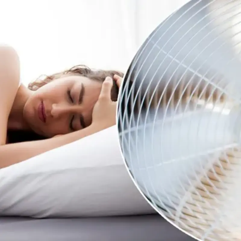 Doctors Warn of Alarming Health Risks of Sleeping with a Fan On During Hot Weather