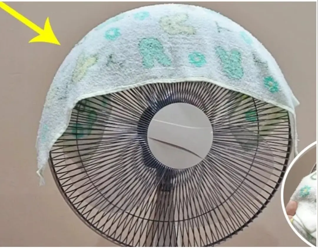 Covering a towel on an electric fan, a useful tip that cannot be missed in the summer