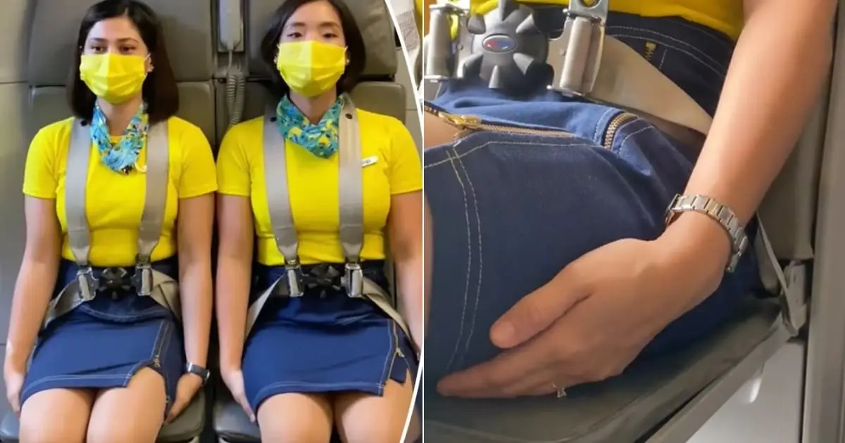 Flight attendant explains why cabin crew members always sit on their hands during takeoff