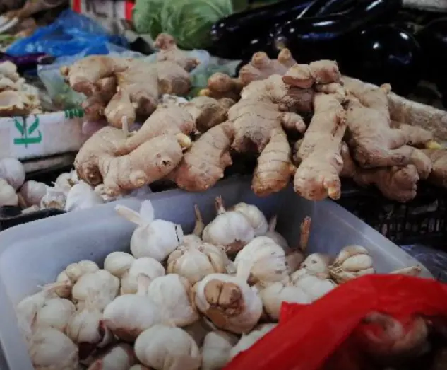 Why should m.en eat a slice of ginger after waking up in the morning?