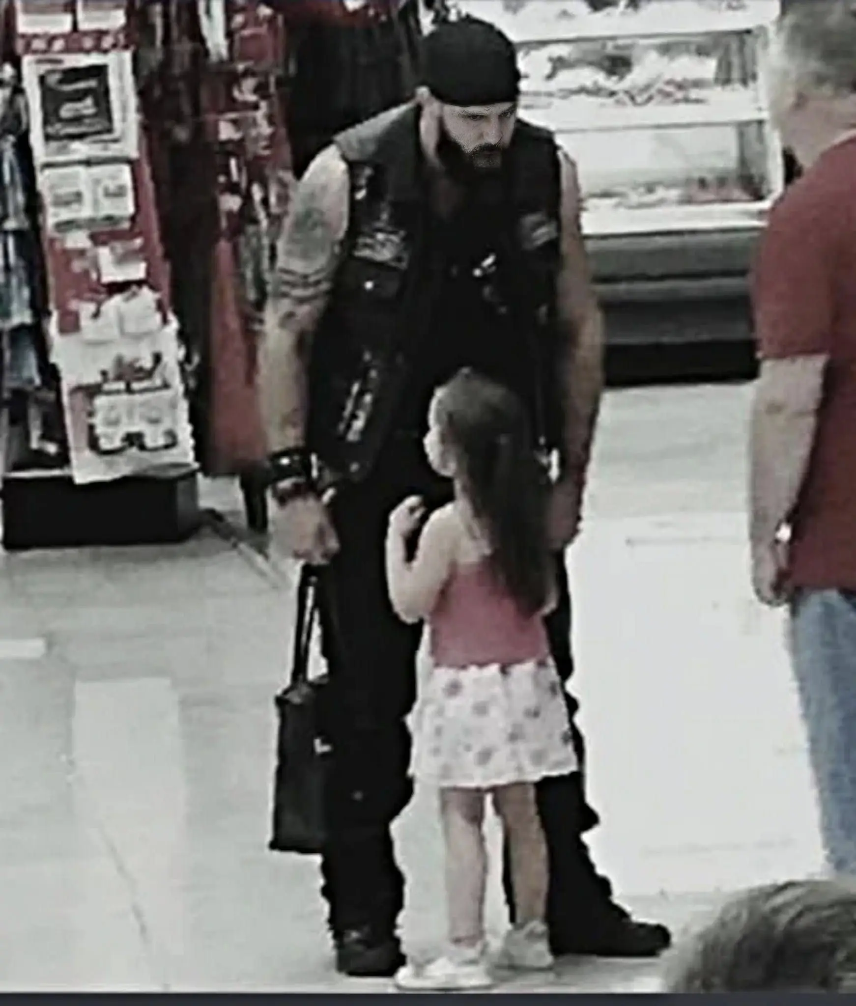 Mute girl rushes to scary biker at Walmart knowing his secret