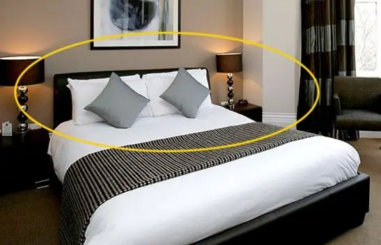 A Hotel Bed for Two but Four Pillows? The Unexpected Reason Few People Know — Try It Yourself!