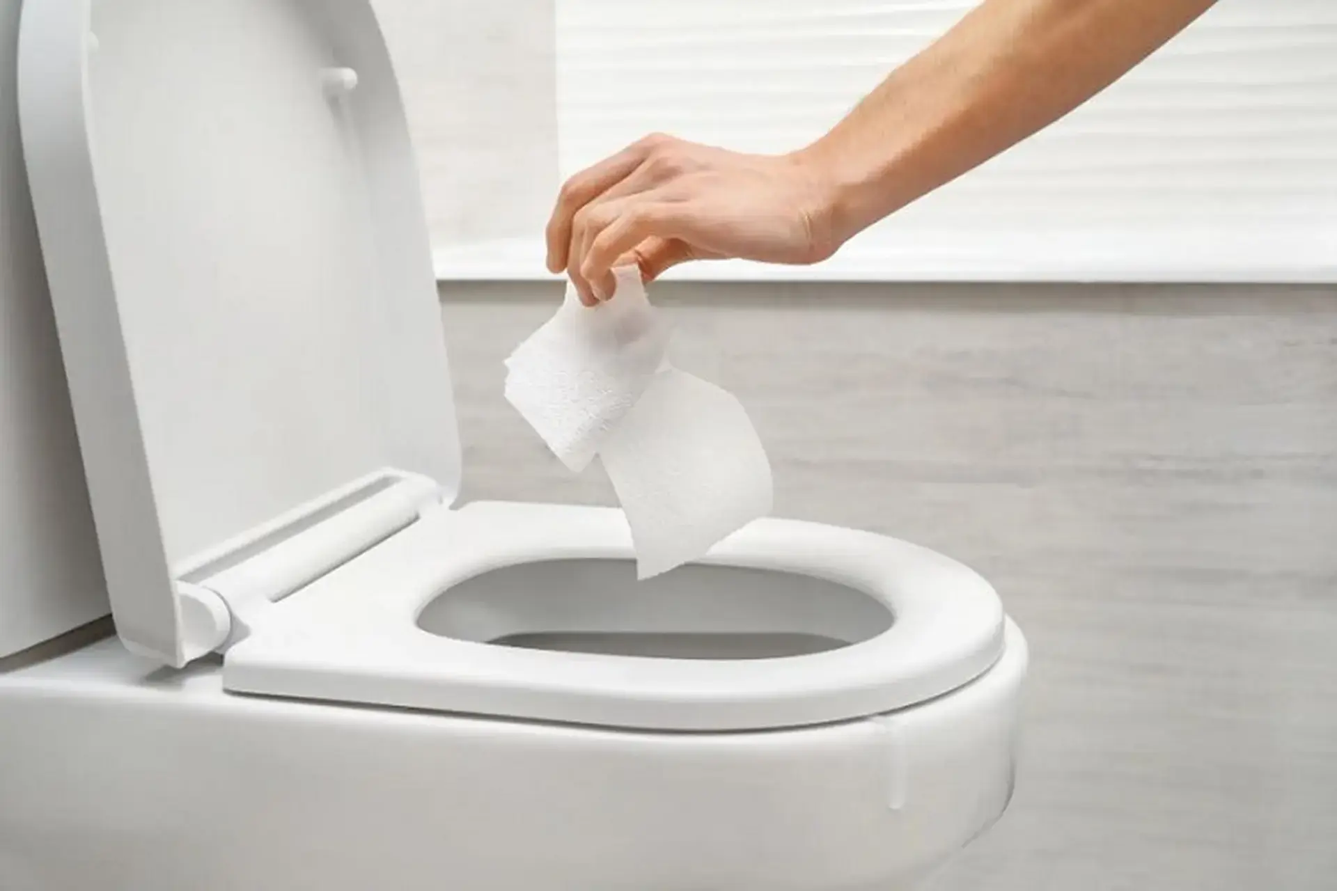 Why Dropping a Piece of Toilet Paper into the Toilet Before Using It Can Improve Hygiene and Comfort