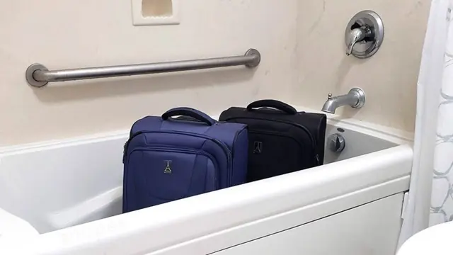 Why many people place their suitcase in the bathtub right after checking into a hotel room
