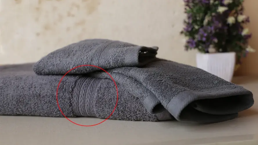 The hidden purpose behind the lines on bath towels
