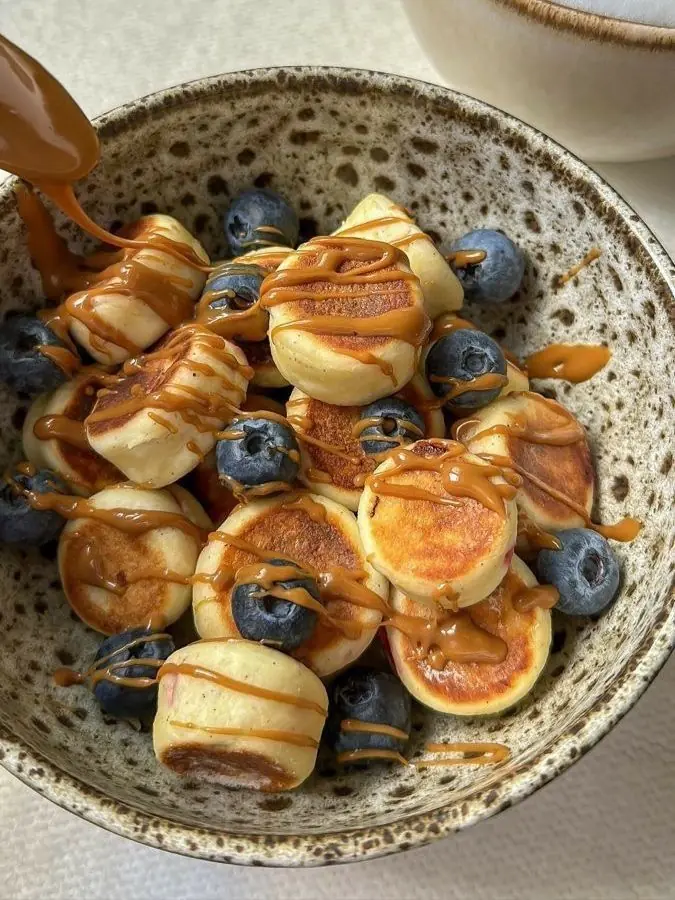 Mini Pancakes with Blueberries and Peanut Butter Drizzle
