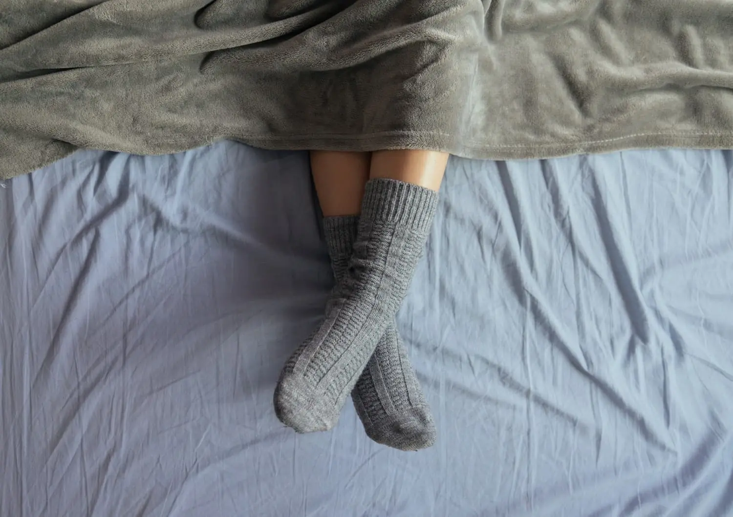 What Happens When You Sleep Wearing Socks Might Surprise You
