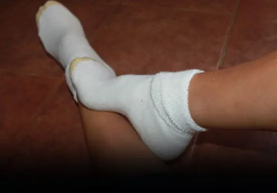 Here’s What Really Happens When You Sleep with Socks On