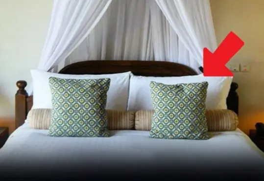 Why do hotel beds often have 4 pillows?