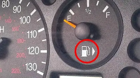 Most people will spend their entire lives without ever realizing what the small arrow next to the gas gauge actually means