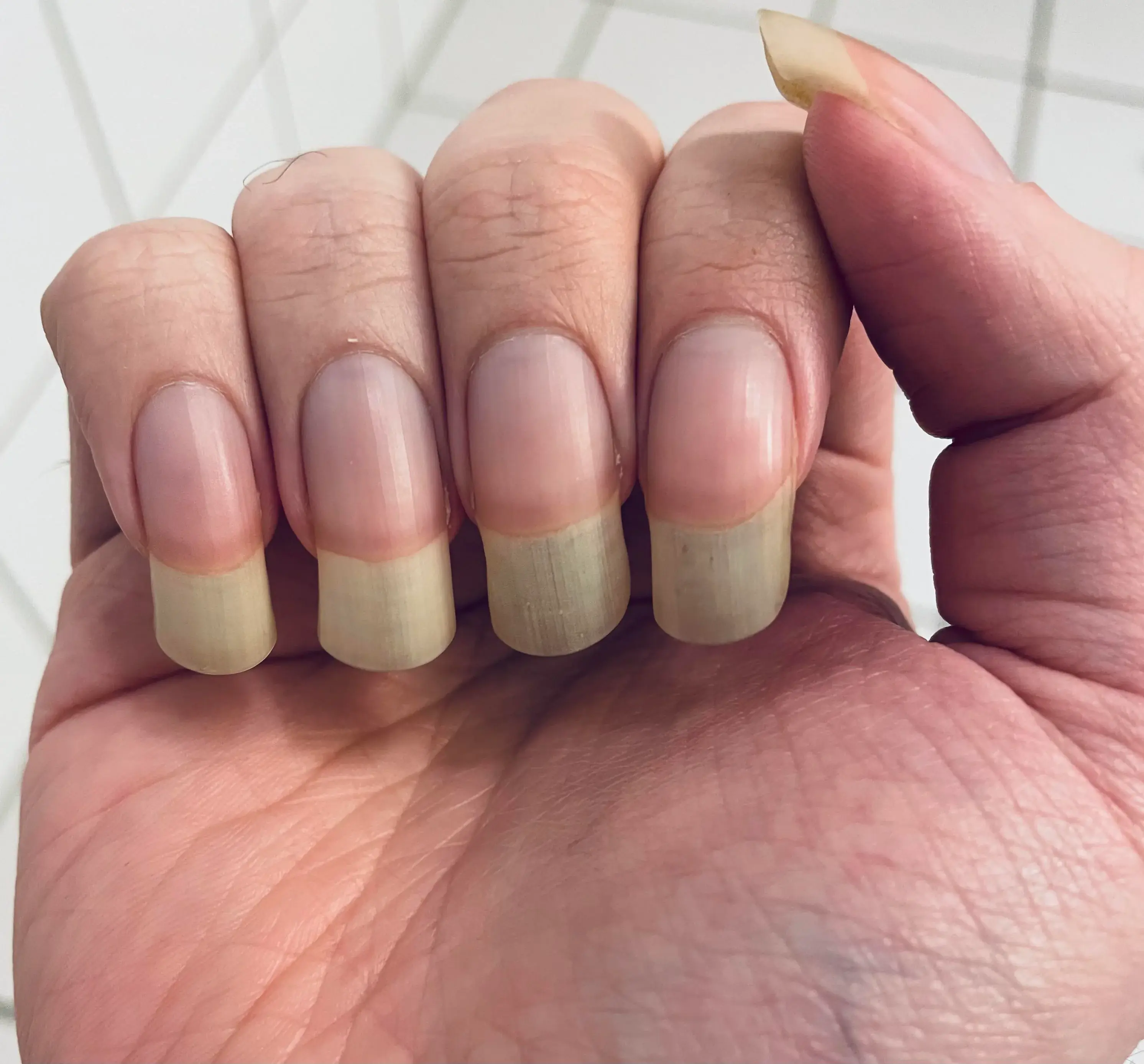 What Does It Mean When a Man Grows One Nail Long?