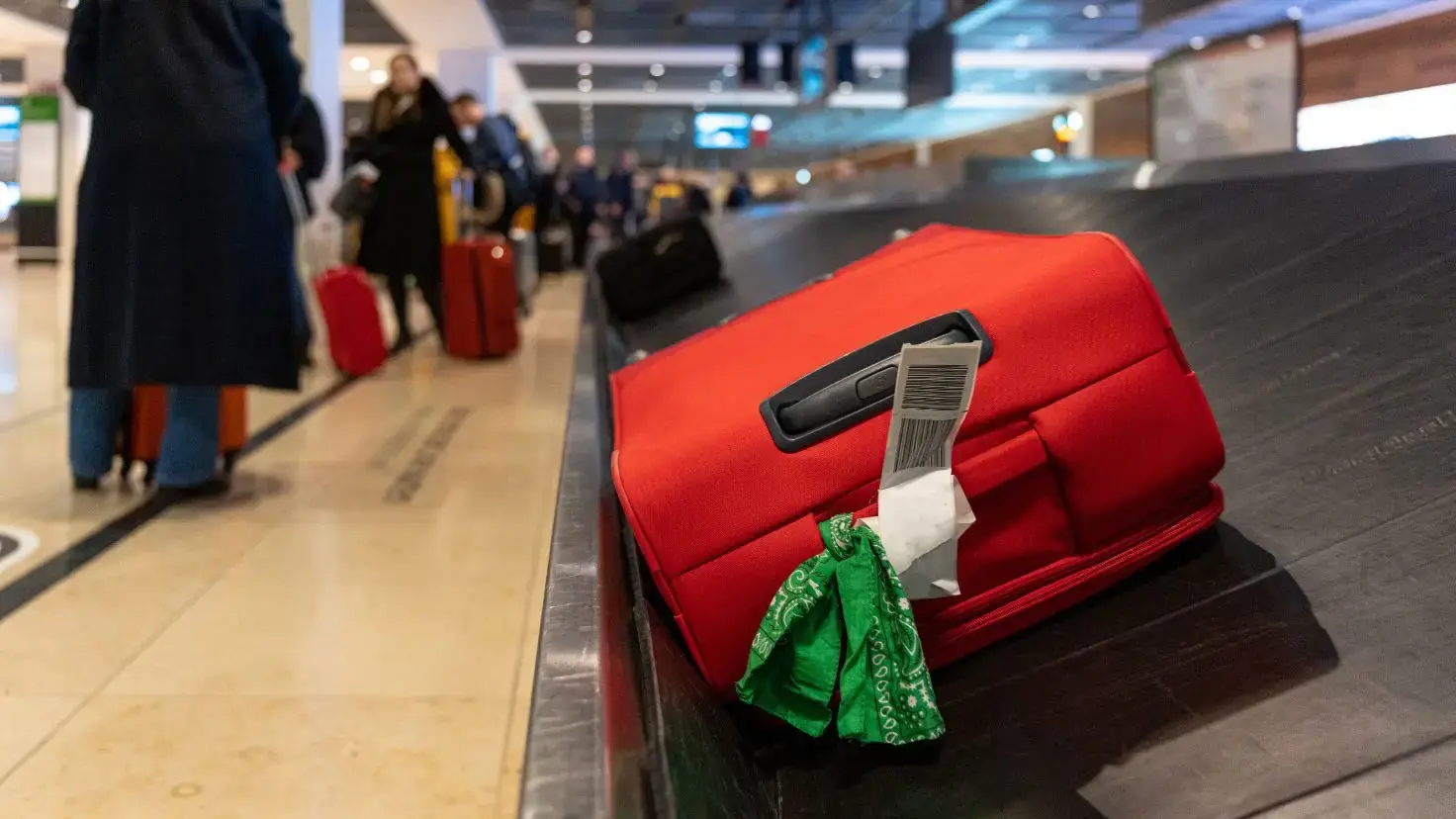 Baggage Handler Shares Important Warning for Anyone Decorating Their Suitcase