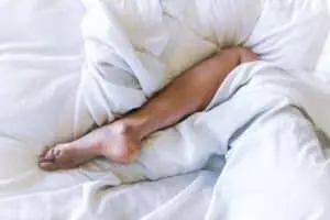 Do You Sleep with One Leg Outside the Blanket? Here’s Why