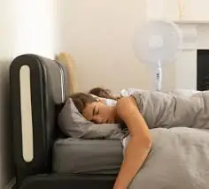 Here’s What Doctors Say Happens When You Sleep with a Fan On