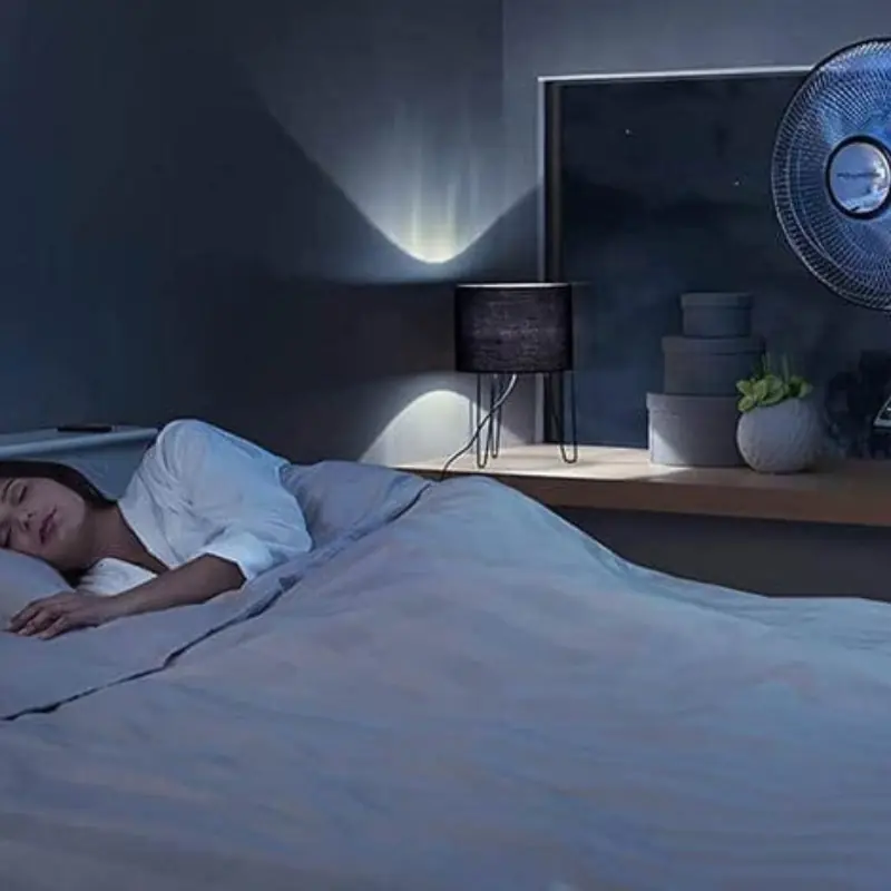 Should You Sleep With a Fan On? Experts Explain the Risks and Benefits