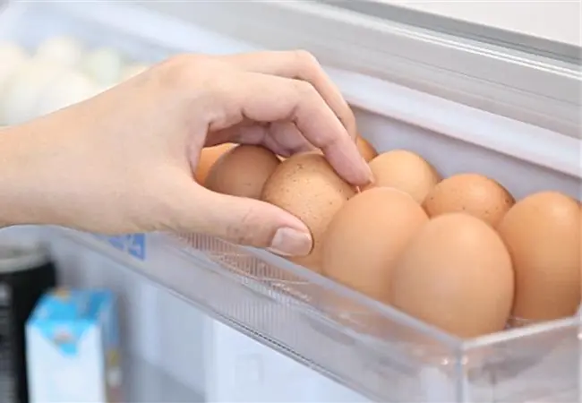 Many people store eggs on the fridge door, but this can cause them to spoil sooner and lose their quality