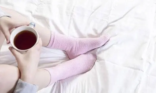 What happens to your body when you wear socks to bed? The surprising effects