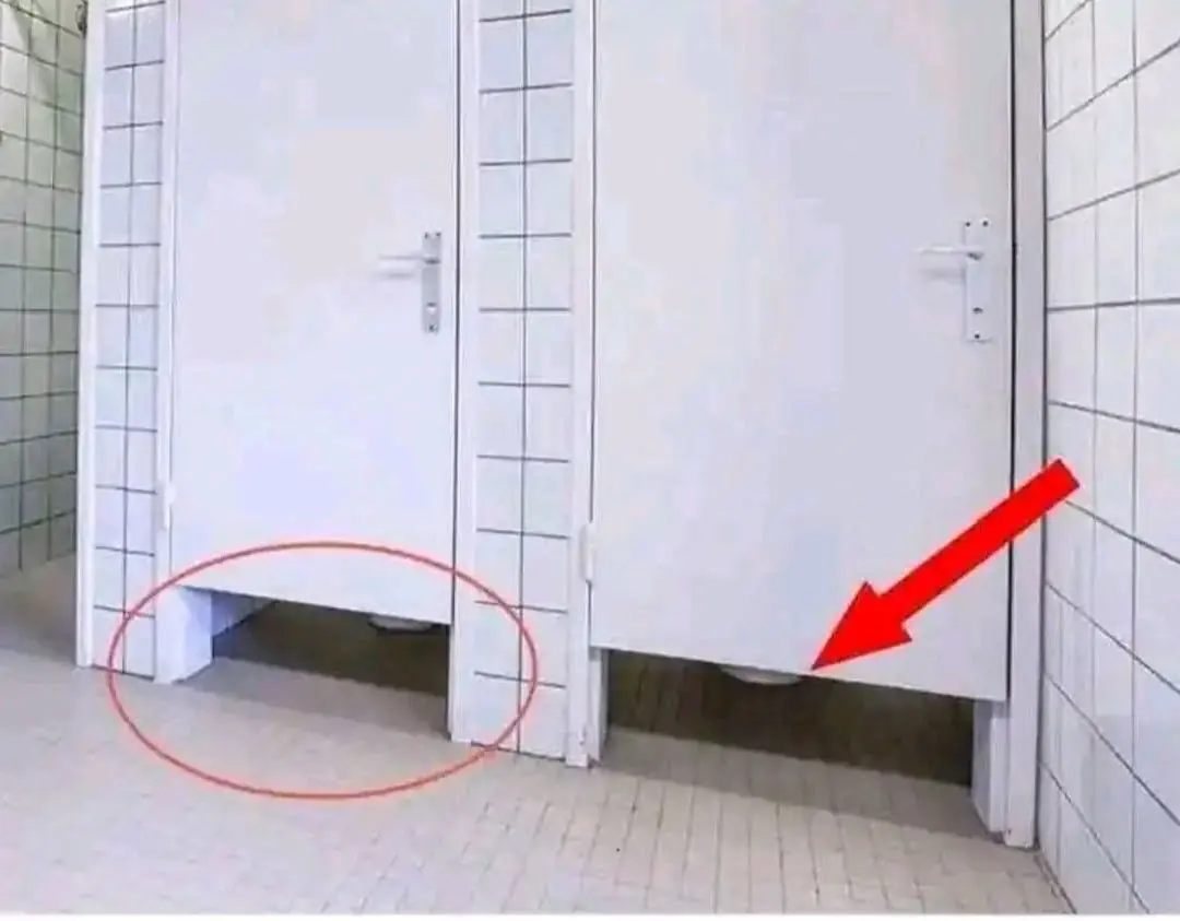 Why Public Bathroom Doors Don’t Reach the Floor: The Surprising Reasons Behind the Design