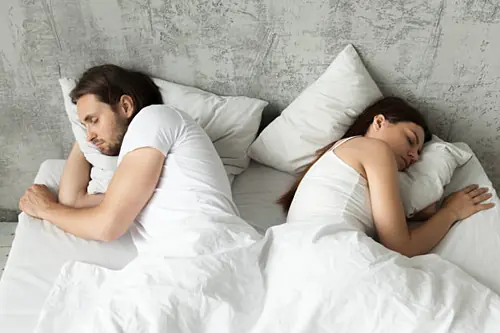 Why Your Partner Sleeps Facing Away and What It Might Mean?