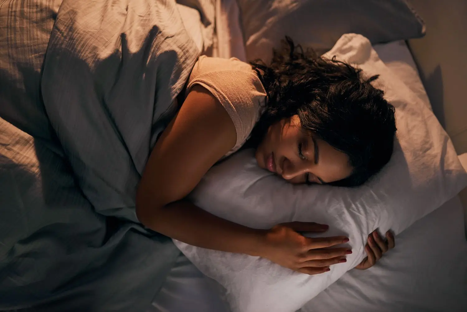 Why Sleeping on Your Left Side May Benefit Your Health, According to Experts