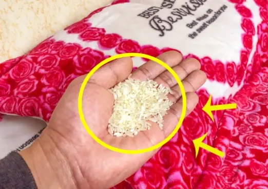 Why do many people place a handful of rice under their pillow?