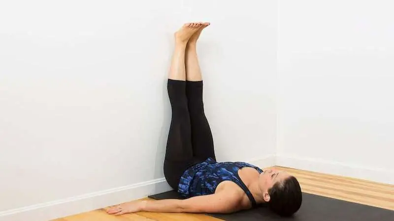 What happens when you keep your legs elevated against a wall for 5 minutes daily?