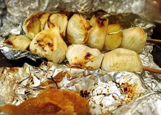 Burn a few cloves of garlic and leave them in the middle of the house.