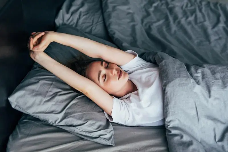 Do You Often Sleep With Both Arms Raised Above Your Head? Experts Say It May Be More Than Just a Habit