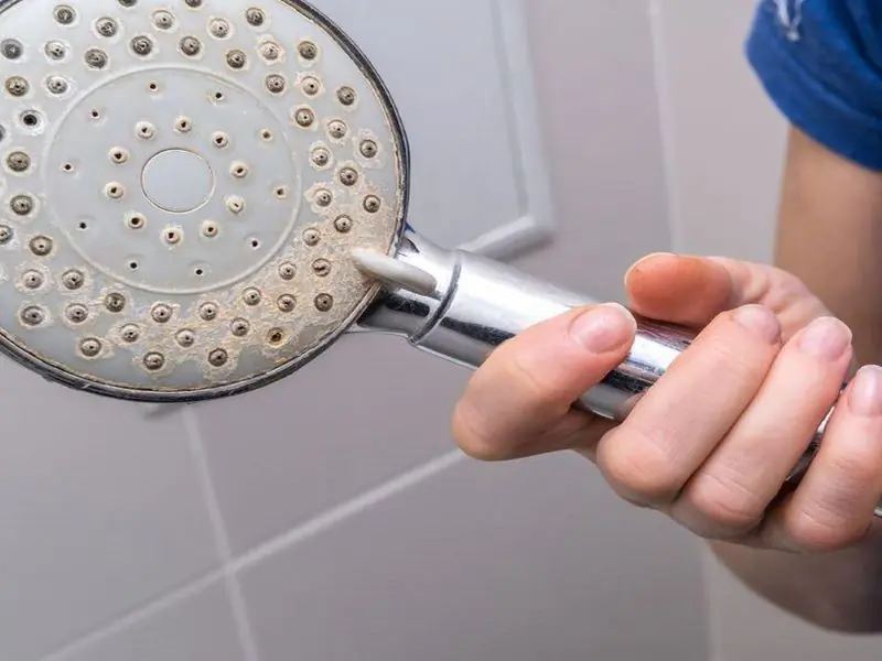 A Clogged Shower Head? This Simple Household Hack Can Make a Big Difference