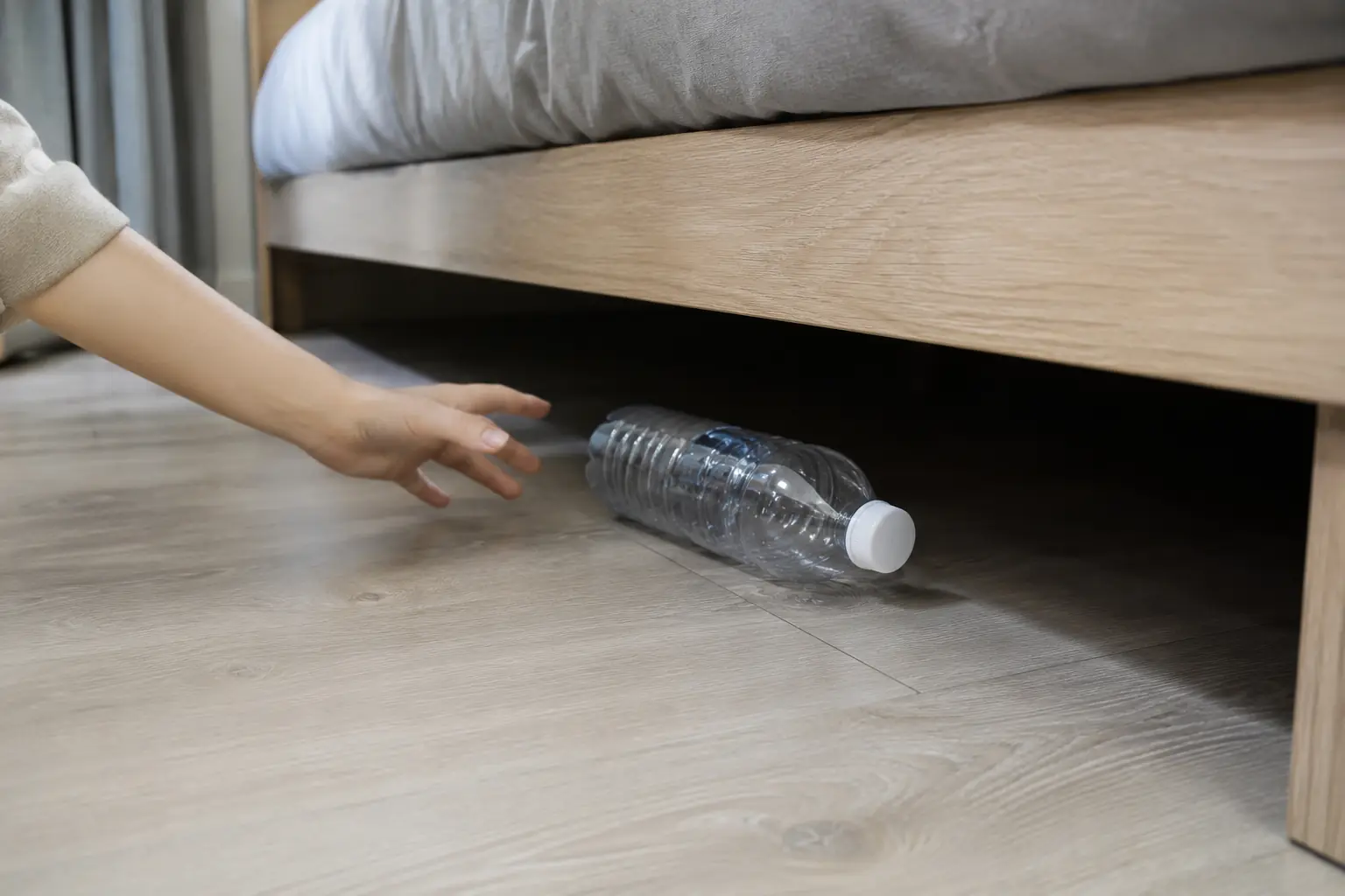 Why Do Smart Travelers Throw a Water Bottle Under the Hotel Bed? The Surprising Safety Trick Explained