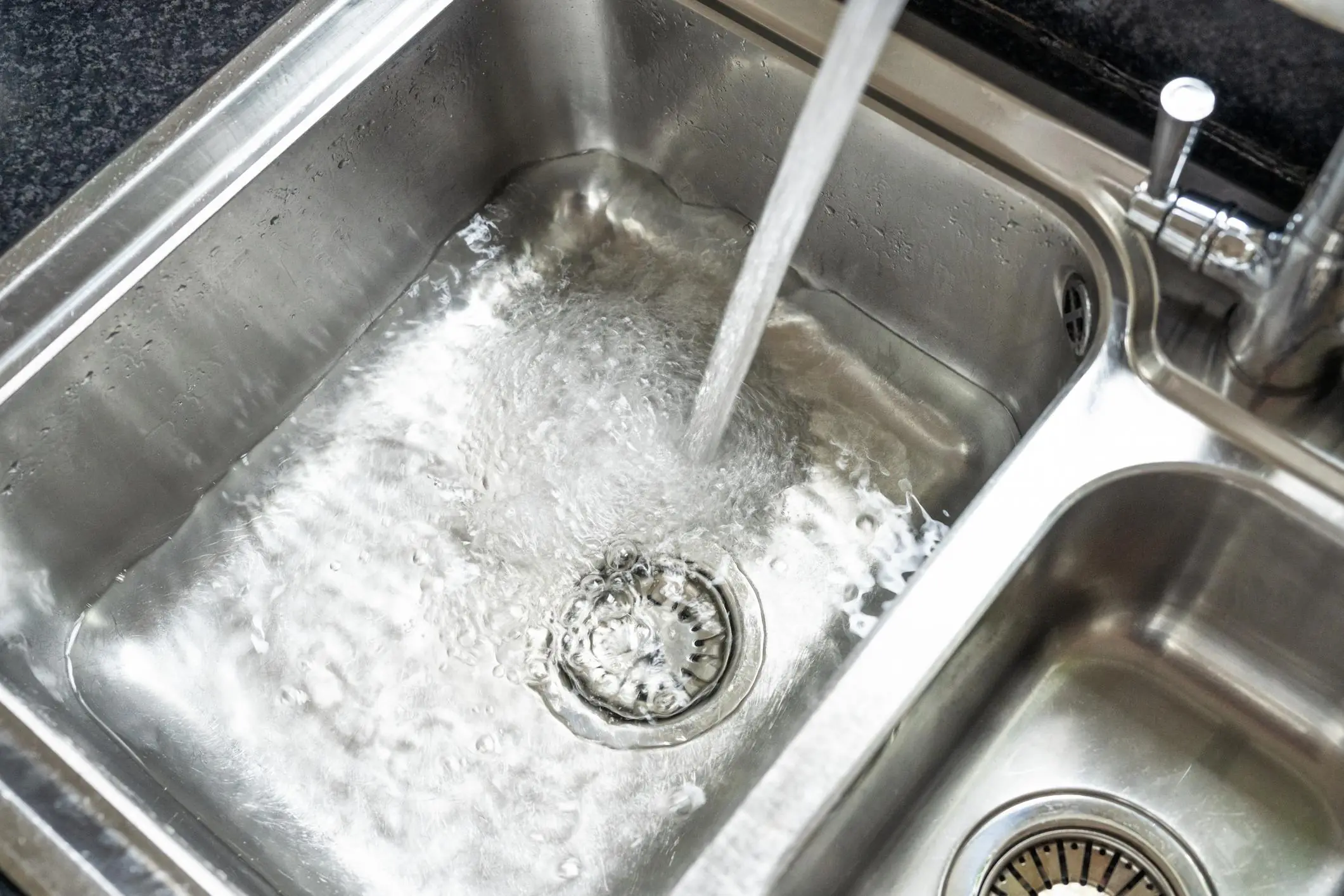 Don't Pour Hot Water Into a Clogged Sink! Here's the Safer Way to Clear It and Eliminate Bad Odors