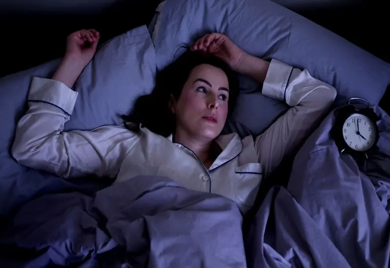 Waking Up During the Night Isn't Always Normal - Here's What Could Be Behind It