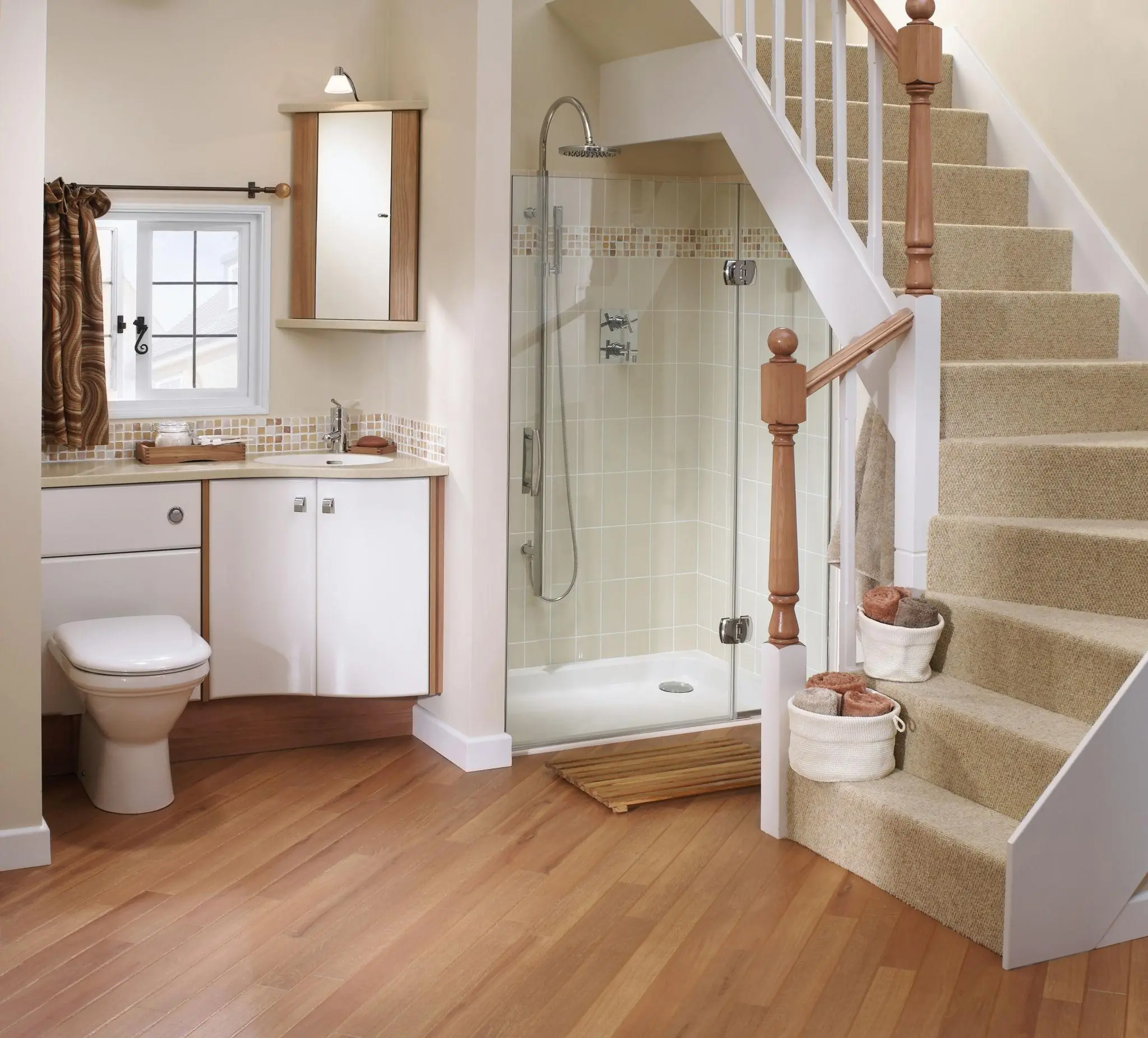 Why You Should Never Build a Bathroom Under the Stairs, According to Construction Experts