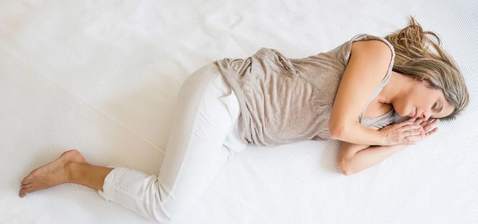 Sleeping on Your Left Side May Benefit Your Body in Several Ways—Here's What Experts Say