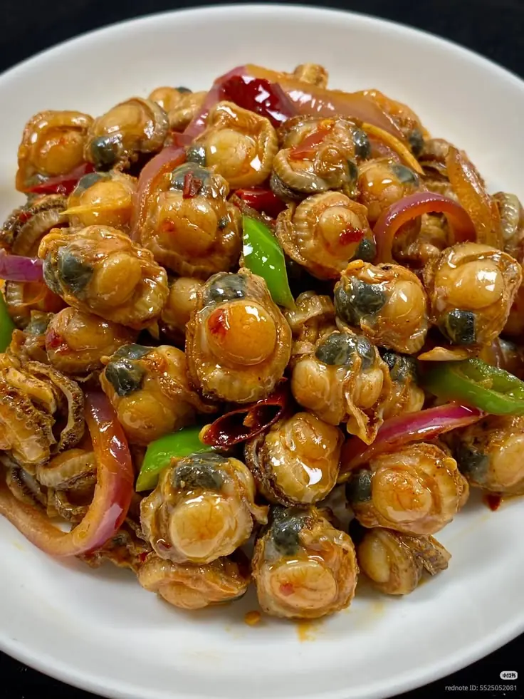 Spicy Stir-Fried Baby Clams with Peppers & Red Onion