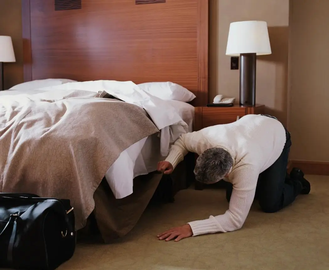 Why Experienced Travelers Roll a Water Bottle Under the Hotel Bed Before Sleeping