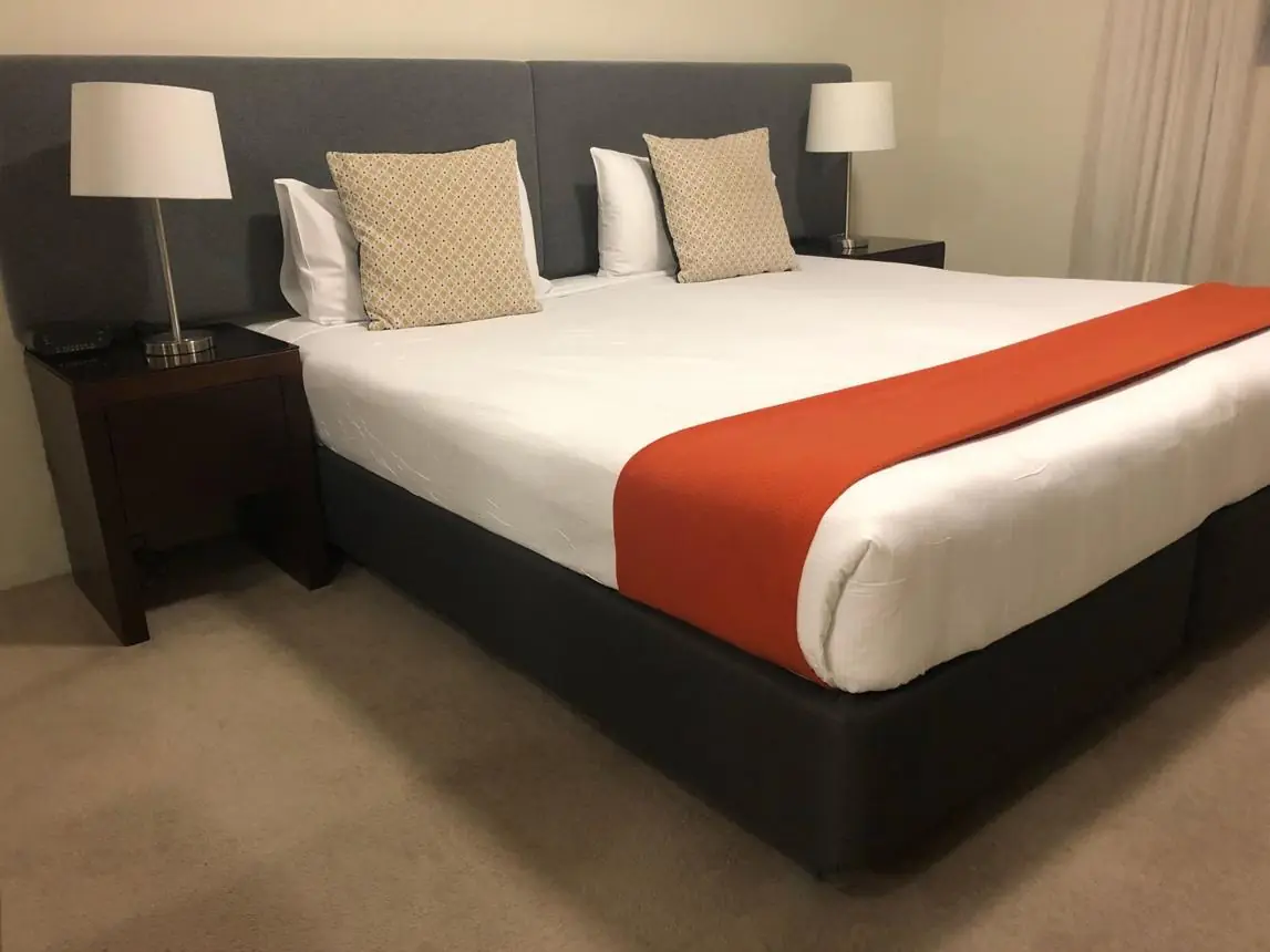 Why Do Hotels Place a Cloth Across the Bed? The Surprisingly Practical Reasons Behind It