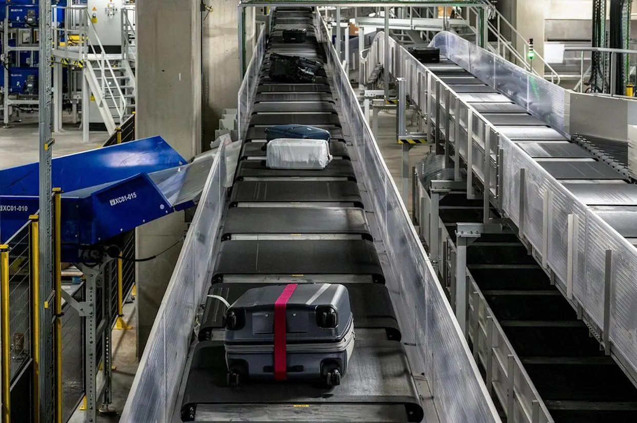 Why Baggage Handlers Say You Should Never Tie a Ribbon to Your Suitcase