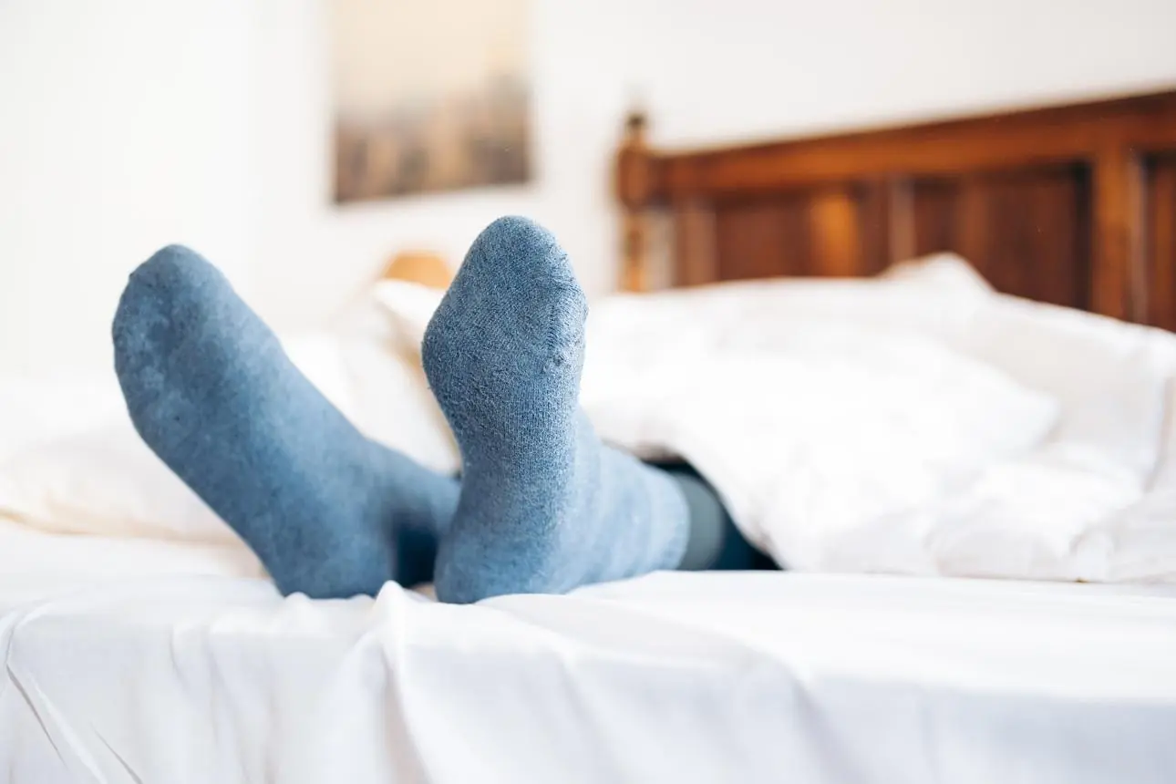 If You Sleep With Socks On, Here’s What Could Happen to Your Body