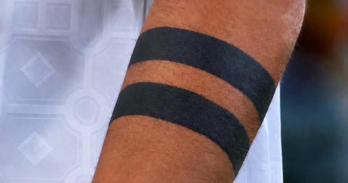 The Meaning of the “Black Band” Tattoo Explained: Why This Simple Design Has Captured So Much Attention