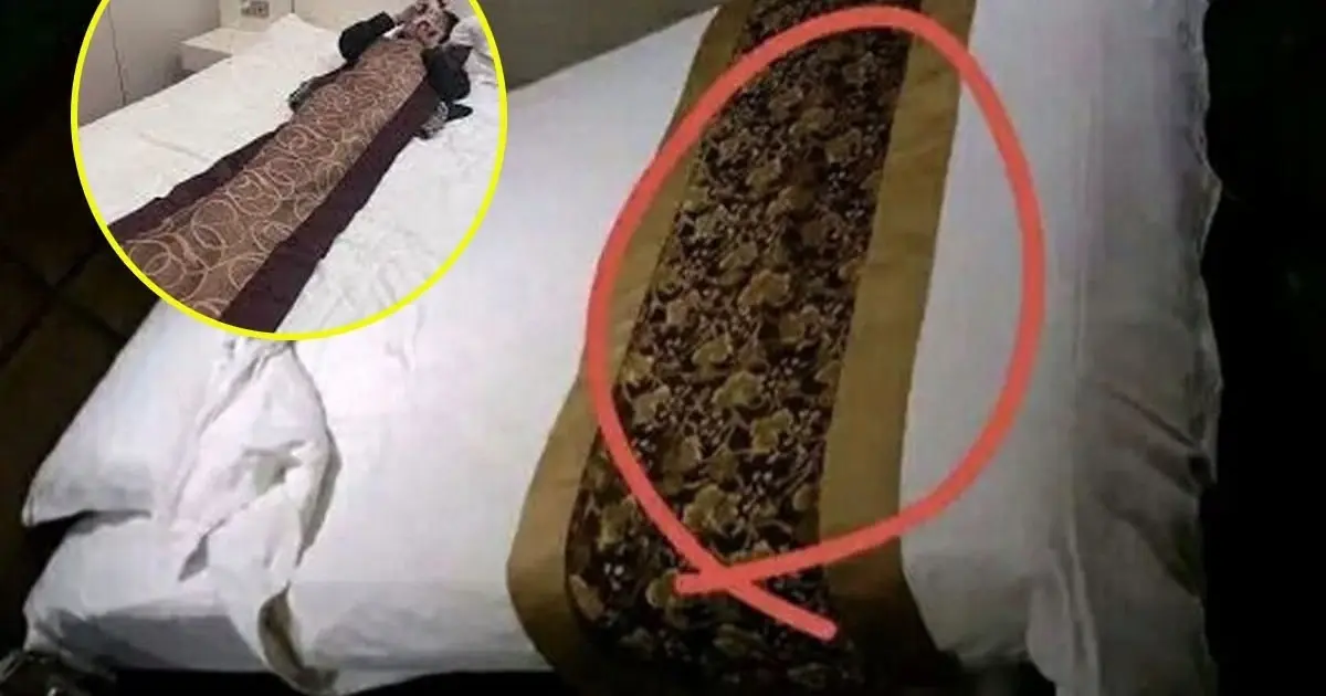 Why do hotels always have a cloth across the bed?